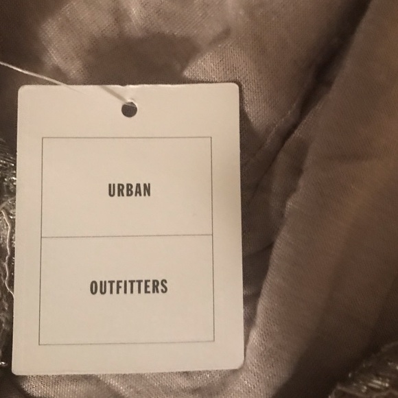 It’s a silver jumpsuit party dress 👗. - Picture 4 of 4